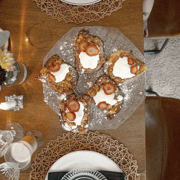 From above: French toast between two place settings